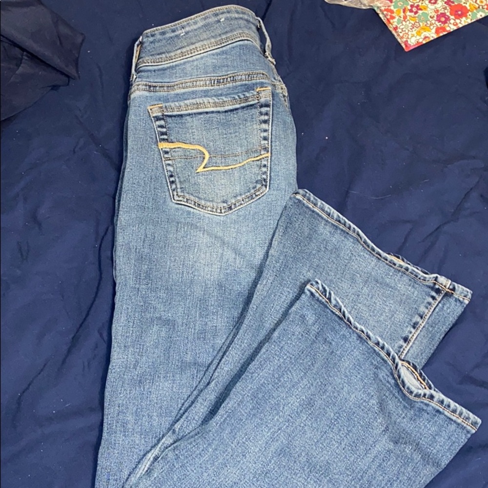 Medium wash boot cut jeans